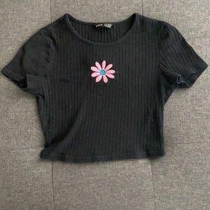 black shirt with pink flower